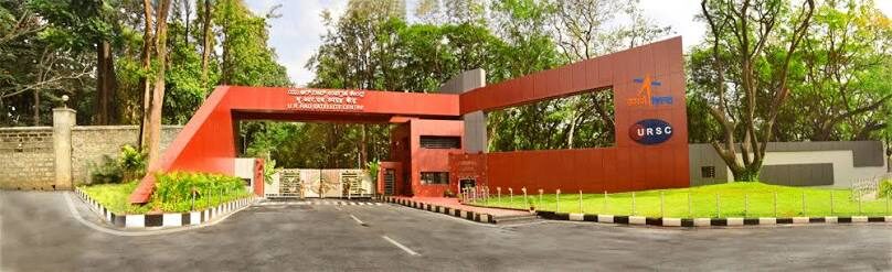 The main gate of U R Rao Satellite Centre — red architectural arch with the ISRO and URSC marks
